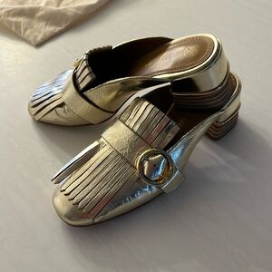 Tory Burch mules in metallic soft gold size 7.5